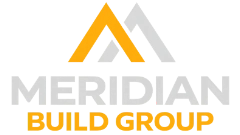 2-meridian-mobil-logo-optim2 Meridian Build Group logo with stylized roof icon in gold and gray above company name on transparent background